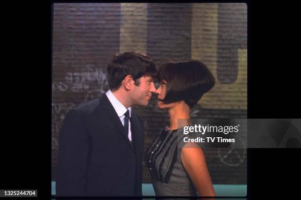 Comedian Jimmy Tarbuck and actress Amanda Barrie, likely on the set of light entertainment series It's Tarbuck, circa 1965.