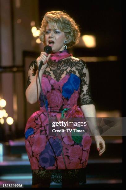 Singer Elaine Paige performing live on stage, circa 1989.