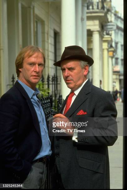 Actors George Cole and Dennis Waterman in character as Arthur Daley and Terry McCann on the set of comedy drama series Minder, circa 1984.