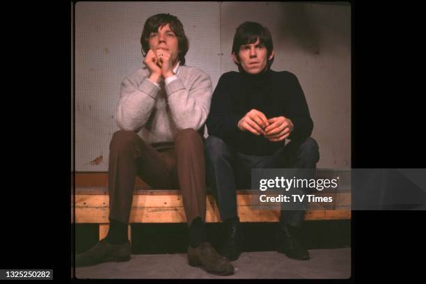 Guitarist Keith Richards and vocalist Mick Jagger of rock & roll group The Rolling Stones on the set of music programme Ready Steady Go! in London,...