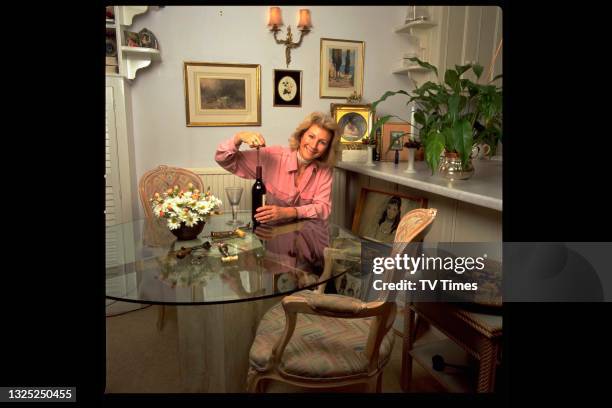 Antiques expert Bunny Campione, best known for her appearances on BBC series Antiques Roadshow, photographed at home, circa 1994.