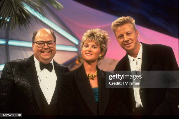 Geoffrey Durham, Anthea Turner and Simon Mayo on the set of entertainment series The Best Of Magic, circa 1989.