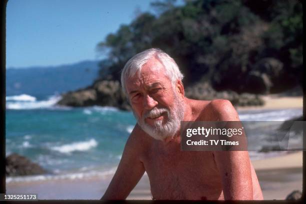 Director John Huston photographed on the beach, likely during production of his film Under The Volcano near Cuernavaca in Mexico, circa 1984.