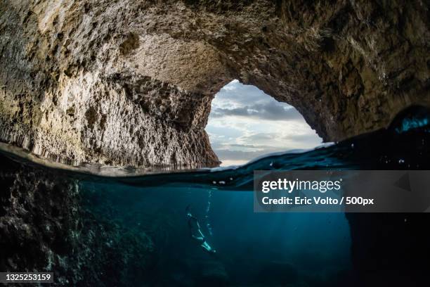 scenic view of sea seen through cave,bonifacio,france - bonifacio stock pictures, royalty-free photos & images