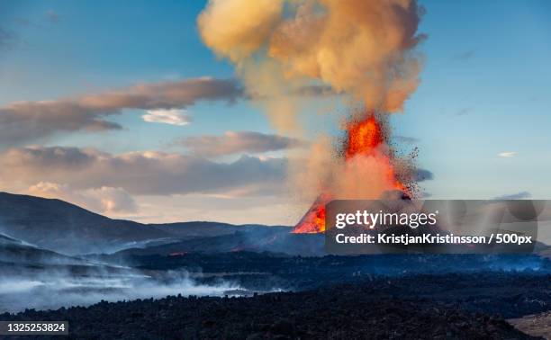 scenic view of volcanic landscape against sky,iceland - eruption stock pictures, royalty-free photos & images