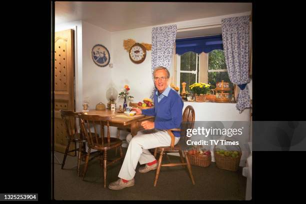 Radio and television presenter Nicholas Parsons at home, circa 2000.