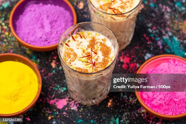 high angle view of drinks on table - lassi stock-fotos und bilder