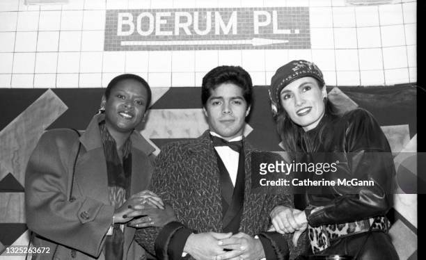 Robin Quivers, Esai Morales and Lisa Sliwa pose for a photo on November 7, 1987 at an event at which the Guardian Angels present radio personality...