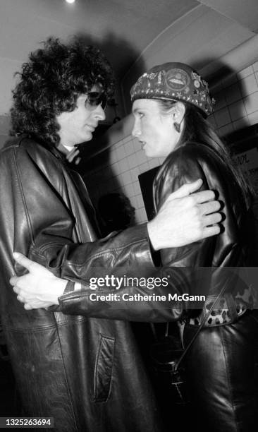 Howard Stern embraces Lisa Sliwa on November 7, 1987 at an event at which the Guardian Angels present radio personality Howard Stern with an award to...