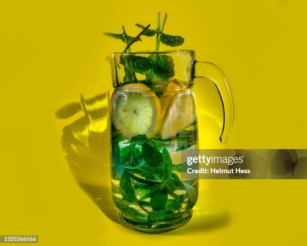 carafe with soft drink - carafe stock pictures, royalty-free photos & images