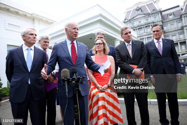 President Joe Biden speaks outside the White House with a bipartisan group of senators after meeting on an infrastructure deal June 24, 2021 in...