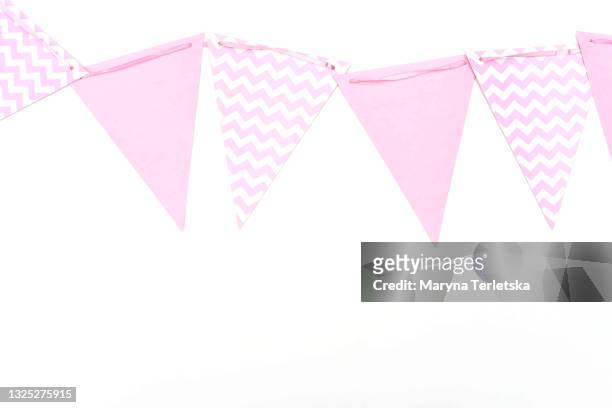 pink flags on a white background. - jubileum werk stockfoto's en -beelden