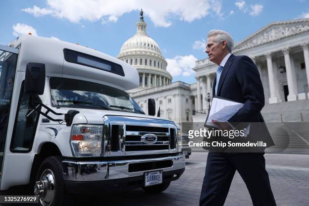 Sen. Rob Portman prepares to board a buss and leave the U.S. Capitol for a meeting at the White House on June 24, 2021 in Washington, DC. Following...