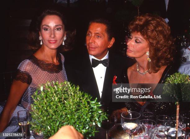Nadia, Valentino Garavani and Sophia Loren attend "Valentino: Thirty Years of Magic" Gala Retrospective at the 67th Street Armory in New York City on...