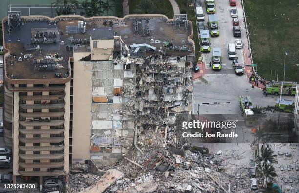 Search and Rescue personnel work after the partial collapse of the 12-story Champlain Towers South condo building on June 24, 2021 in Surfside,...