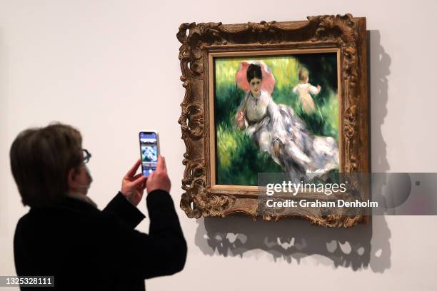Visitor attends the opening of French Impressionism from the Museum of Fine Arts and Goya: Drawings from the Prado Museum at NGV International on...