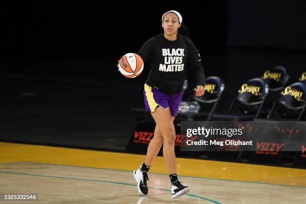 Guard Arella Guirantes of the Los Angeles Sparks warms up before the game against the Phoenix Mercury at Los Angeles Convention Center on June 16,...