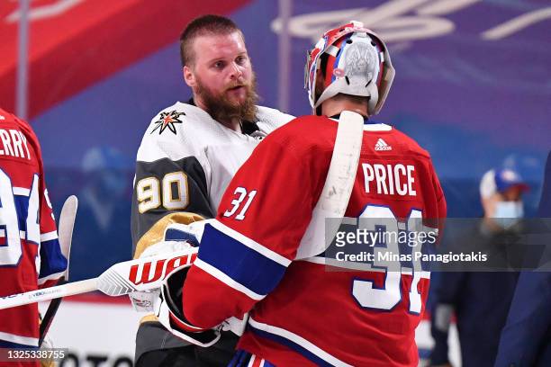Carey Price of the Montreal Canadiens and Robin Lehner of the Vegas Golden Knights shake hands following the Canadians 3-2 overtime win in Game Six...