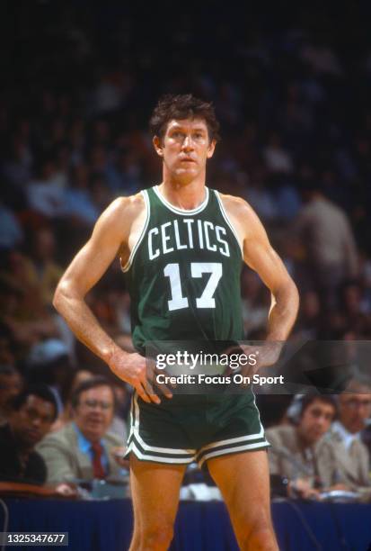 John Havlicek of the Boston Celtics looks on against the Washington Bullets during an NBA basketball game circa 1977 at the Capital Centre in...
