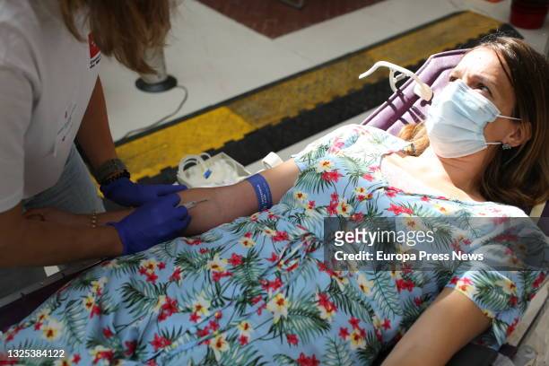 Person comes to donate blood to the device put in place at the headquarters of the regional government, the Real Casa de Correos, on June 25 in...