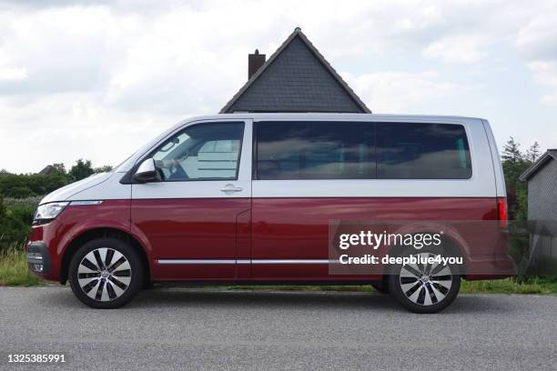 vw t6 multivan parked on the country road - vw bus stock pictures, royalty-free photos & images