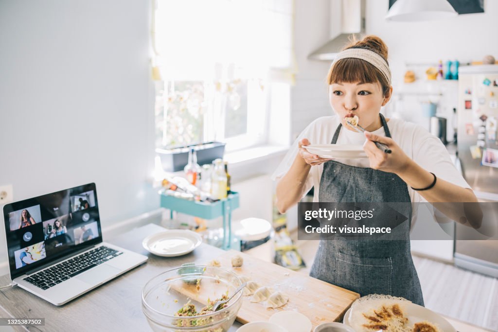 Japanese woman filming gyoza tutorial