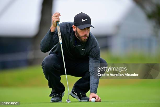 Romain Wattel of France lines before his putt on the 18th hole during Day Two of the Open de Bretagne at Golf Bluegreen de Pleneuf Val Andre on June...