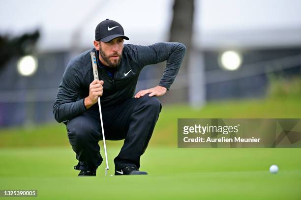 Romain Wattel of France lines before his putt on the 18th hole during Day Two of the Open de Bretagne at Golf Bluegreen de Pleneuf Val Andre on June...
