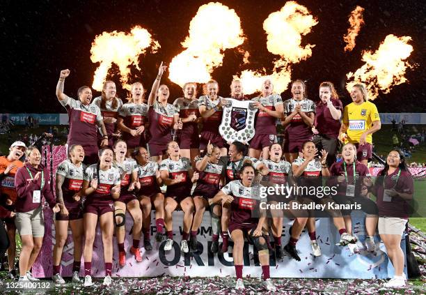 The Queensland team celebrates victory after the Women's Rugby League State of Origin match at the Sunshine Coast Stadium on June 25, 2021 in...