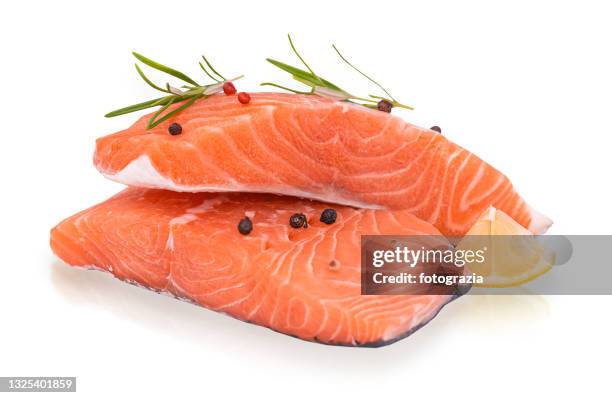 fresh salmon pieces isolated on white background - salmon steak stockfoto's en -beelden