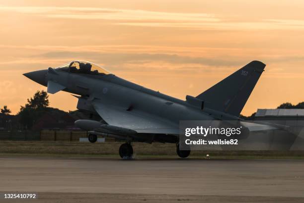 raf typhoon landing at sunset - eurofighter typhoon stock pictures, royalty-free photos & images