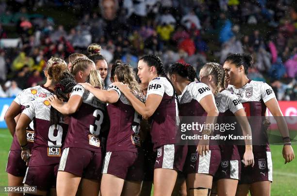 The Queensland players embrace during the Women's Rugby League State of Origin match between Queensland and New South Wales at the Sunshine Coast...