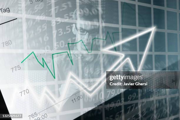 economy graph: rising arrow and executive man. - interest stockfoto's en -beelden