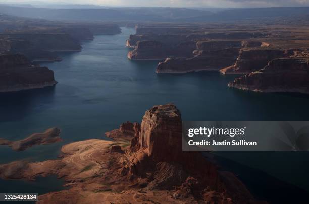 In this aerial view, Low water levels are visible at Lake Powell on June 24, 2021 in Lake Powell, Utah. As severe drought grips parts of the Western...