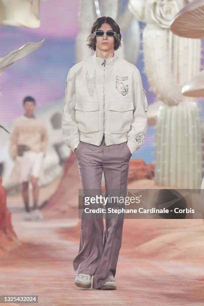 Model walks the runway during the Dior Homme Menswear Spring Summer 2022 show as part of Paris Fashion Week on June 25, 2021 in Paris, France.