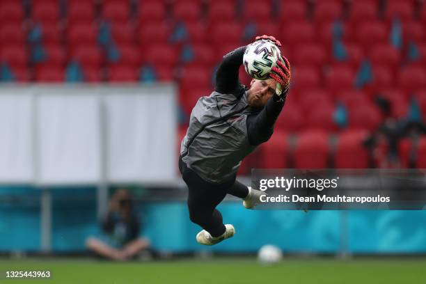 Kasper Schmeichel of Denmark in action during the Denmark Training Session ahead of the UEFA Euro 2020 Round of 16 match between Wales and Denmark at...