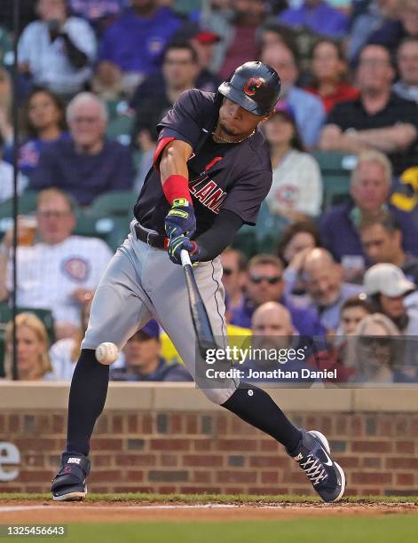 Cesar Hernandez of the Cleveland Indians bats against the Chicago Cubs at Wrigley Field on June 22, 2021 in Chicago, Illinois. The Cubs defeated the...