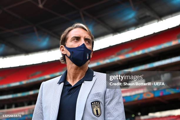 Roberto Mancini, Head Coach of Italy looks on during a pitch inspection during the media activities ahead of the UEFA Euro 2020 Round of 16 match...