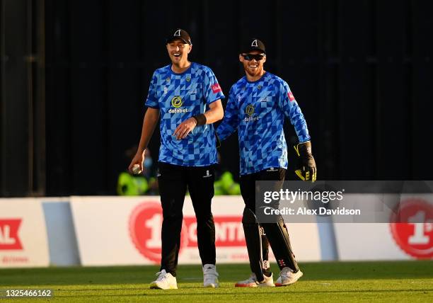 Ollie Robinson of Sussex celebrates with Phil Salt after taking the catch to dismiss Jack Taylor of Gloucestershire during the Vitality T20 Blast...