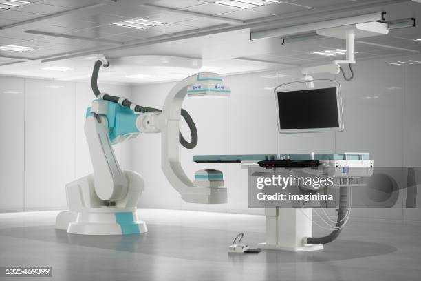 coronary angiogram x-ray system with c-arm - angiogram stock pictures, royalty-free photos & images