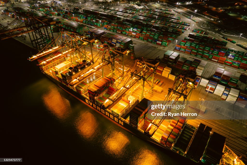 Aerial view of Port of Los Angeles with cranes, gantries, and shipping containers