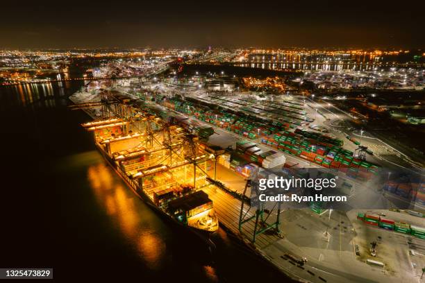 aerial view of port of los angeles with cranes, gantries, and shipping containers - port of los angeles stock pictures, royalty-free photos & images