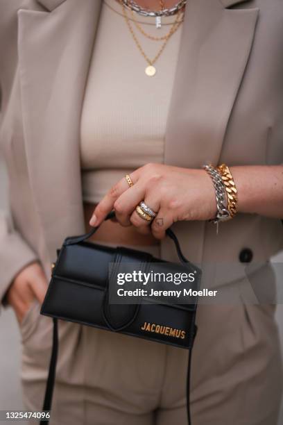 Franzi Koenig wearing light brown Zara blazer, light brown NAKD pants, black Jacquemus mini leather bag and Fafe Collection jewelry poses on June 18,...