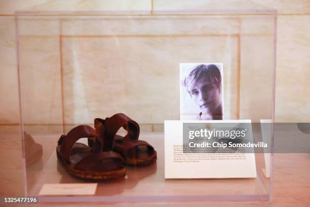 Pair of Matthew Shepard's sandals are displayed at the White House as part of the commemoration of LGBTQ+ Pride Month on June 25, 2021 in Washington,...