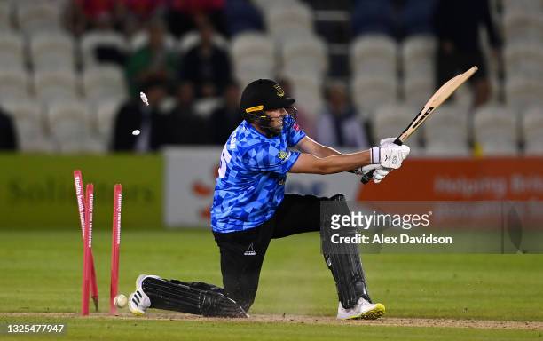 Ollie Robinson of Sussex is bowled by Ryan Higgins during the Vitality T20 Blast match between Sussex Sharks and Gloucestershire at The 1st Central...