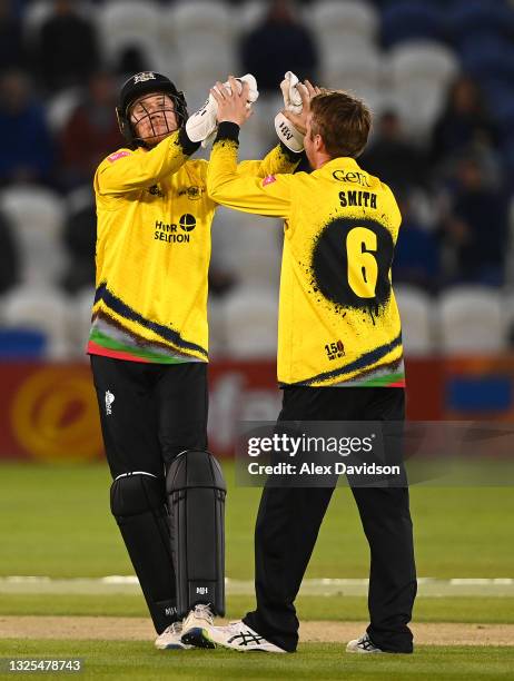 James Bracey and Tom Smith of Gloucestershire celebrate the wicket of Will Beer of Sussex during the Vitality T20 Blast match between Sussex Sharks...