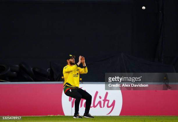 Chris Dent of Gloucestershire takes the catch of Delray Rawlins of Sussex during the Vitality T20 Blast match between Sussex Sharks and...