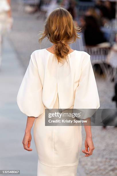 Model walks the runway during the Chanel 'Collection Croisiere 2012' show on May 9, 2011 in Cap d'Antibes, France.