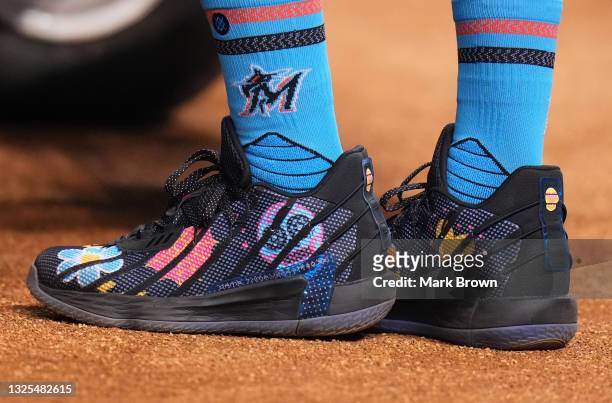 Detailed view fo the Adidas cleats worn by Starling Marte of the Miami Marlins during batting practice prior to the game against the Toronto Blue...