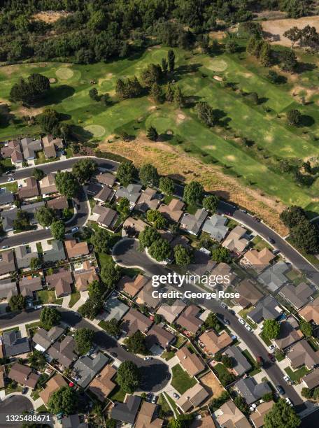 Neighborhood of single family homes on cul de sac streets is viewed adjacent to the Zaca Creek Golf Course in this aerial photo taken on June 16 near...